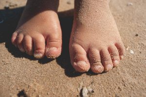 Free Stock Photos for Blogs - Kid Toes in the Sand 1